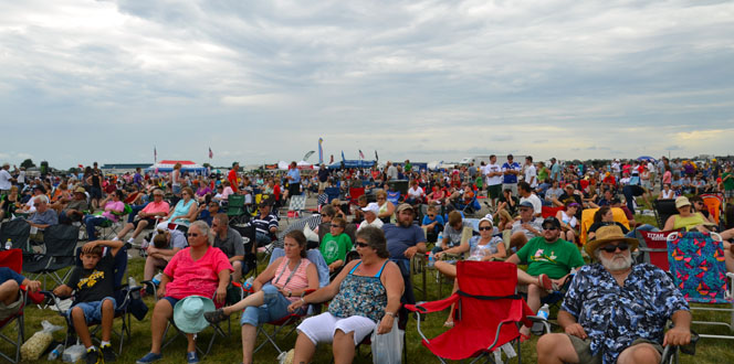 A cloudy day at the Waterloo Air Show. Gawking at gawkers. A surprise attack from the winged angels. Melancholy mood.